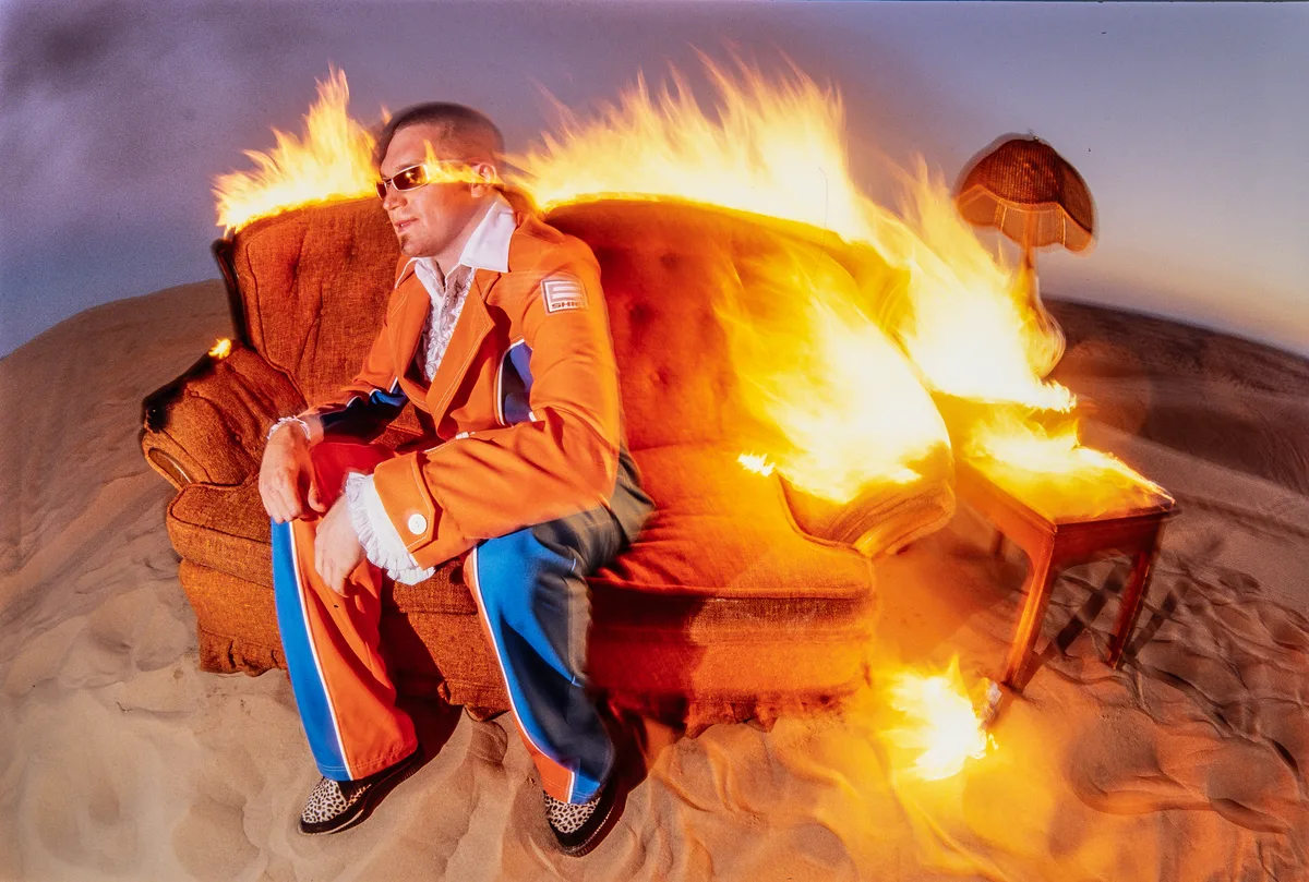 A burning armchair in the desert
